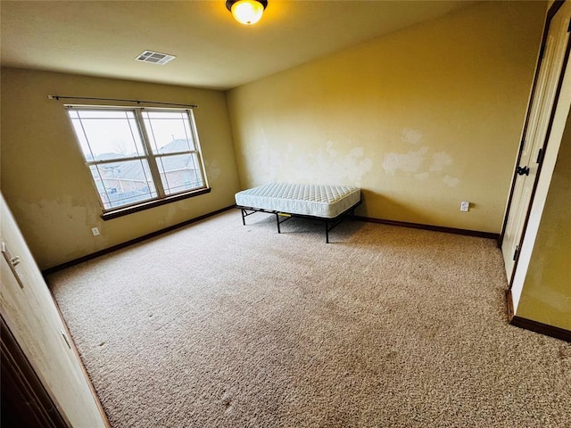 unfurnished bedroom featuring carpet flooring