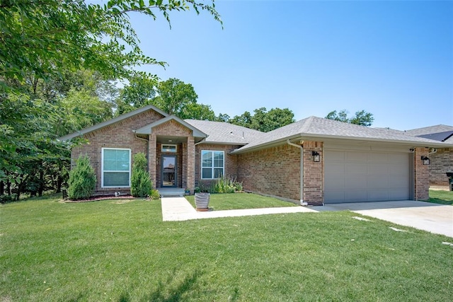 ranch-style home with a garage and a front lawn