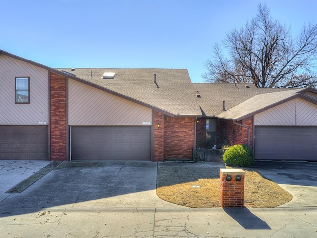 ranch-style house featuring a garage