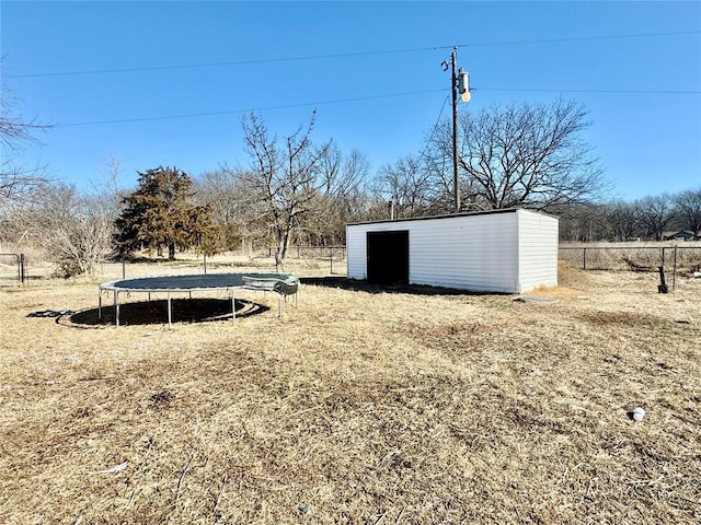 view of yard featuring a trampoline