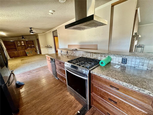 kitchen featuring dark hardwood / wood-style floors, ornamental molding, black appliances, a textured ceiling, and island exhaust hood