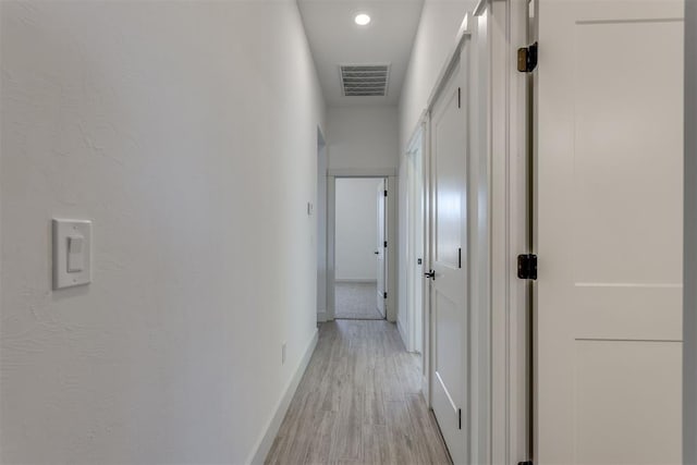 hallway featuring light hardwood / wood-style flooring