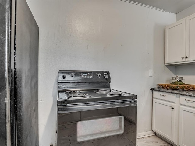 kitchen featuring black appliances and white cabinets