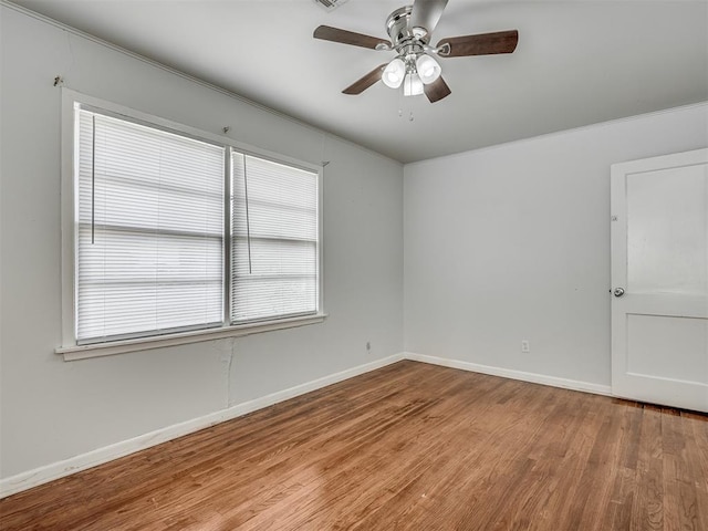 unfurnished room with ceiling fan and light hardwood / wood-style floors