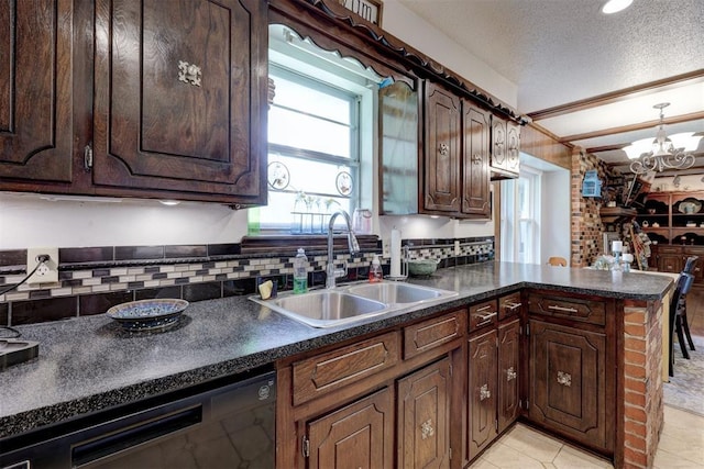 kitchen featuring black dishwasher, sink, dark brown cabinetry, kitchen peninsula, and a textured ceiling