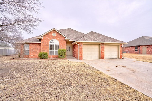 ranch-style home featuring a garage