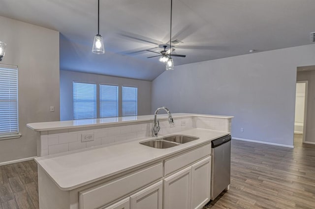 kitchen with sink, white cabinetry, dishwasher, pendant lighting, and a kitchen island with sink