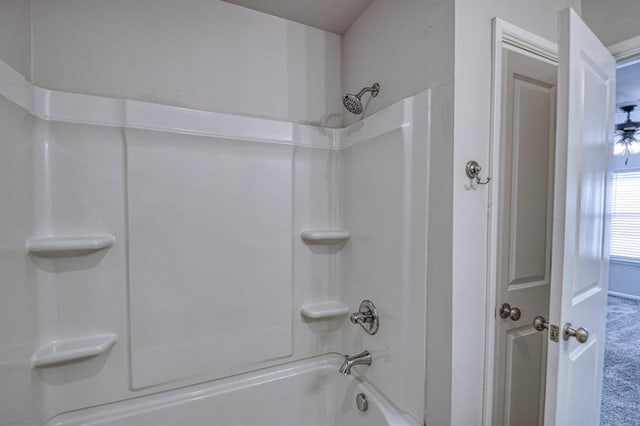 bathroom featuring  shower combination