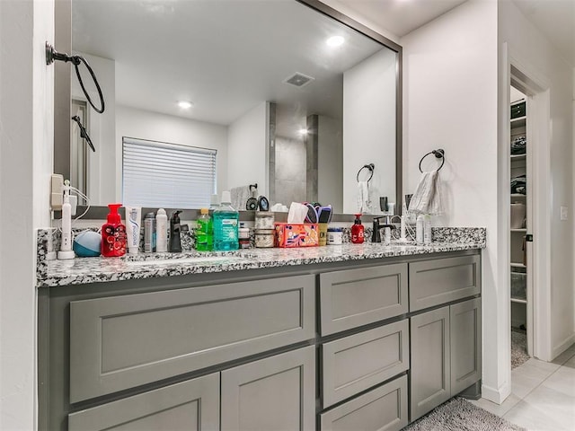 bathroom featuring vanity and tile patterned floors