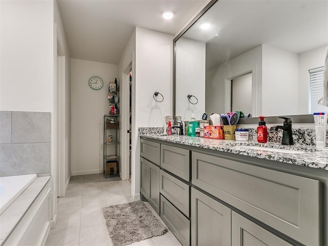 bathroom with vanity and tile patterned flooring