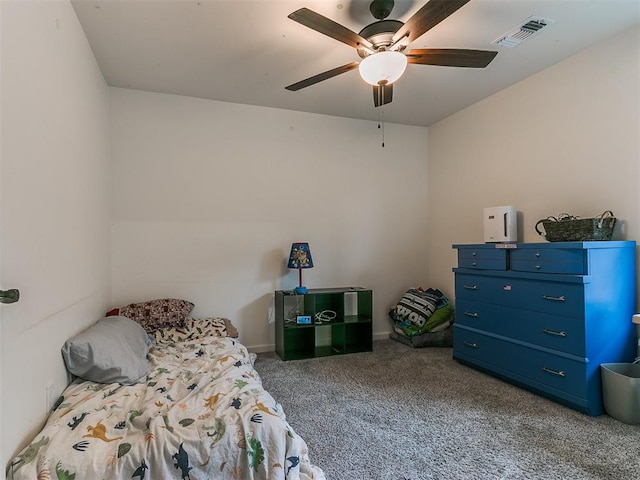 carpeted bedroom with ceiling fan