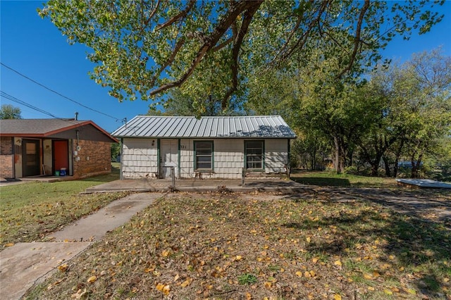 exterior space with a lawn