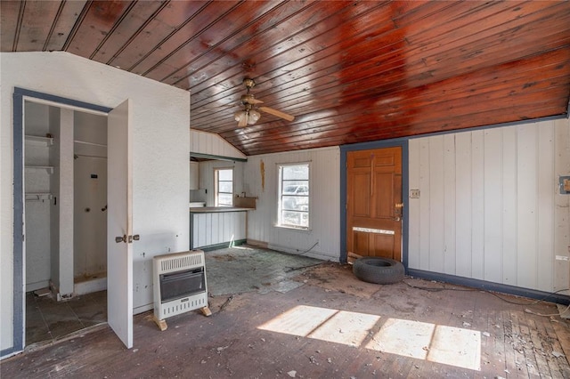 321 N Carol Ter, Mustang, OK 73064 - interior space featuring heating unit, wood ceiling, lofted ceiling, and ceiling fan