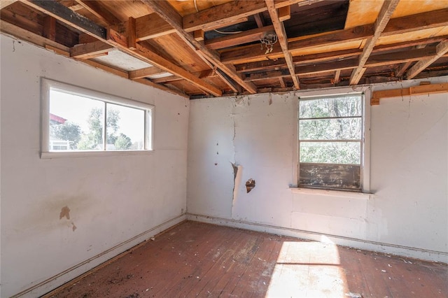 321 N Carol Ter, Mustang, OK 73064 - basement with wood-type flooring and plenty of natural light