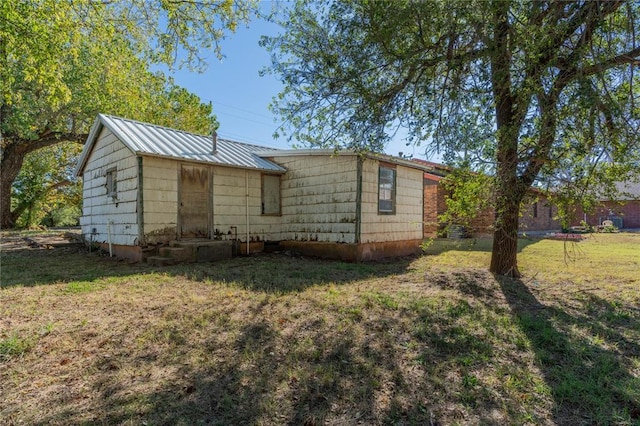 321 N Carol Ter, Mustang, OK 73064 - exterior space featuring a yard