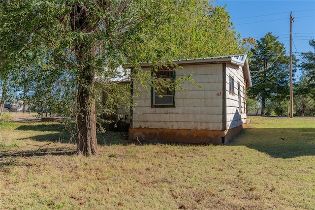 321 N Carol Ter, Mustang, OK 73064 - view of side of home with a lawn