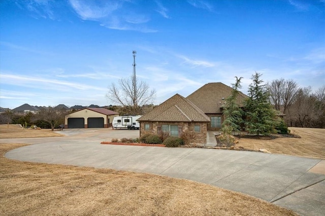 view of front of property with a garage