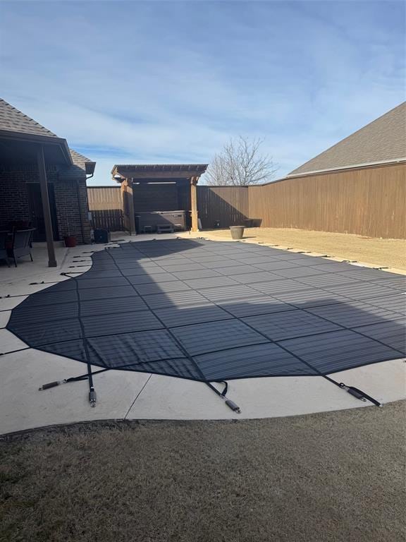 view of swimming pool with a pergola and a patio area