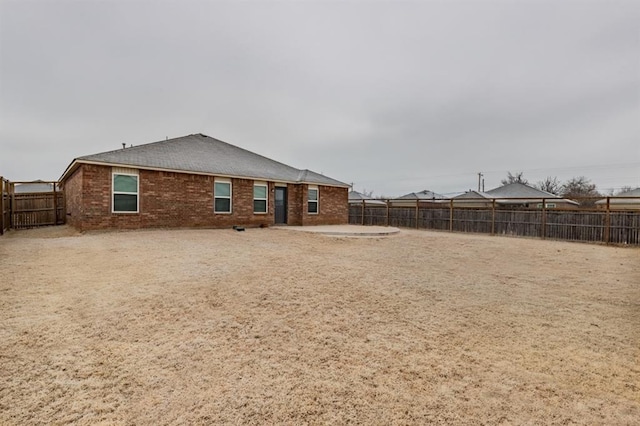 rear view of house with a patio