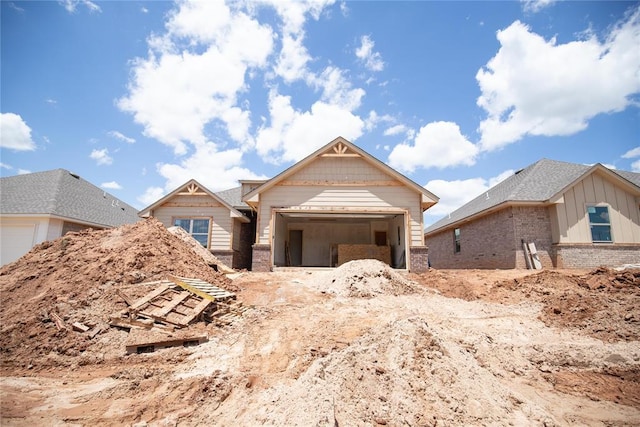 9225 NW 86th St, Yukon, OK 73099 - view of front of home featuring brick siding and an attached garage