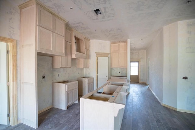 9225 NW 86th St, Yukon, OK 73099 - kitchen with an island with sink and dark wood finished floors