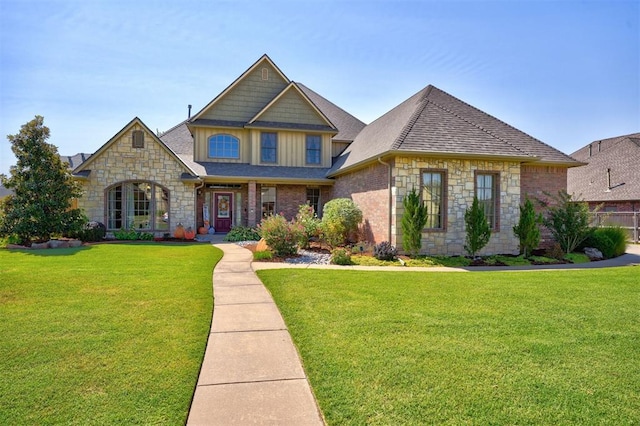 craftsman-style home featuring a front yard