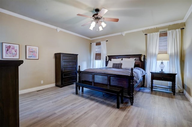 bedroom with crown molding and light wood-type flooring