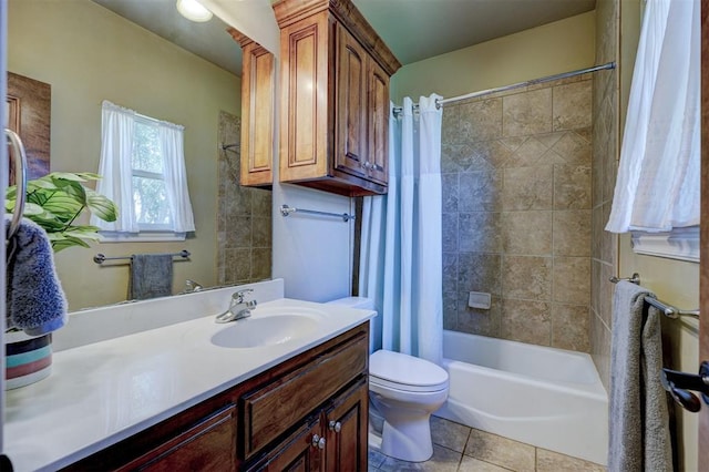 full bathroom with vanity, shower / bath combination with curtain, tile patterned floors, and toilet