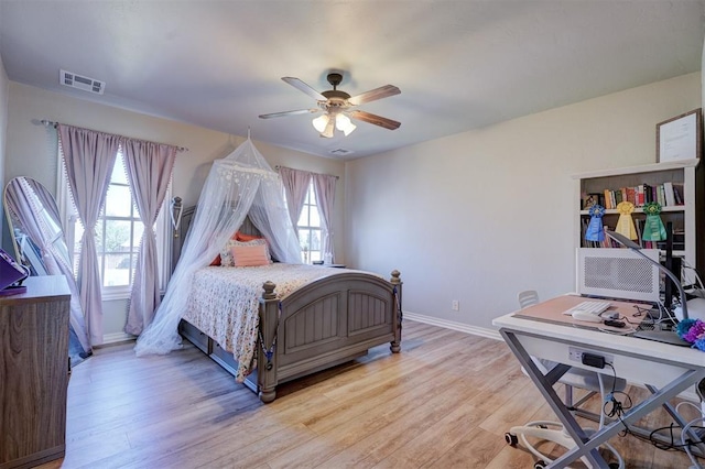 bedroom featuring ceiling fan and light hardwood / wood-style floors