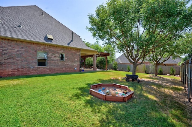 view of yard featuring a fire pit