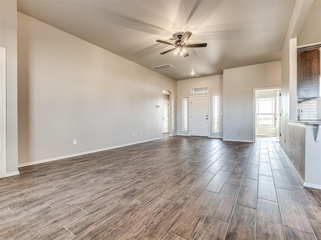 entrance foyer with ceiling fan