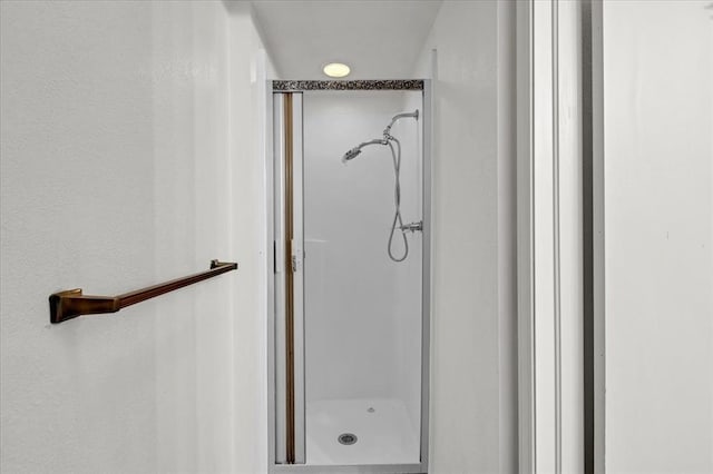 bathroom featuring walk in shower