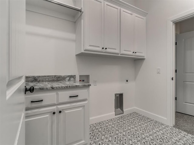 laundry room featuring cabinets, washer hookup, and hookup for an electric dryer