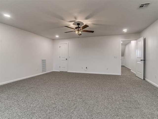 spare room with carpet floors and ceiling fan