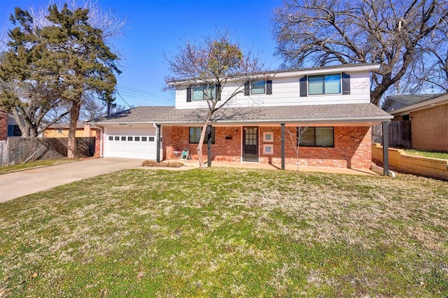 view of property featuring a garage and a front yard