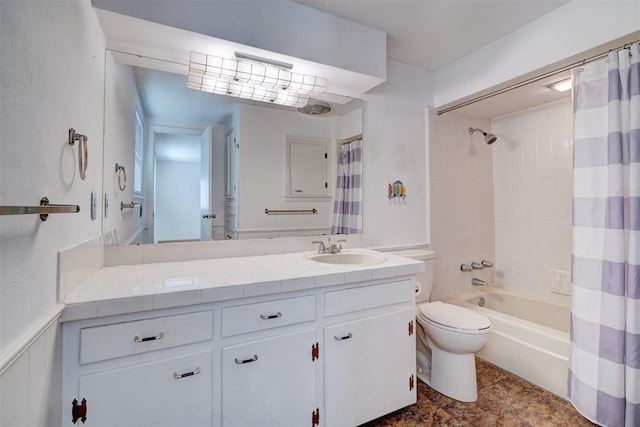 full bathroom featuring toilet, vanity, and shower / bathtub combination with curtain