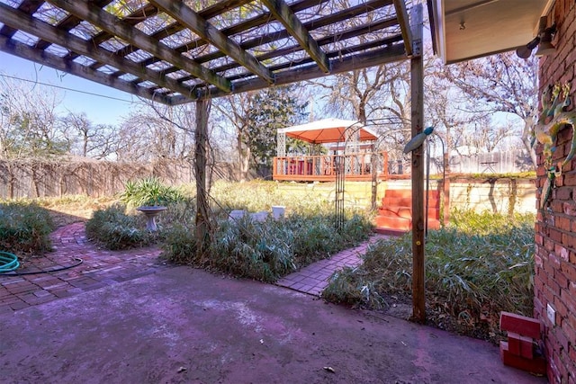 view of yard with a patio area and a pergola