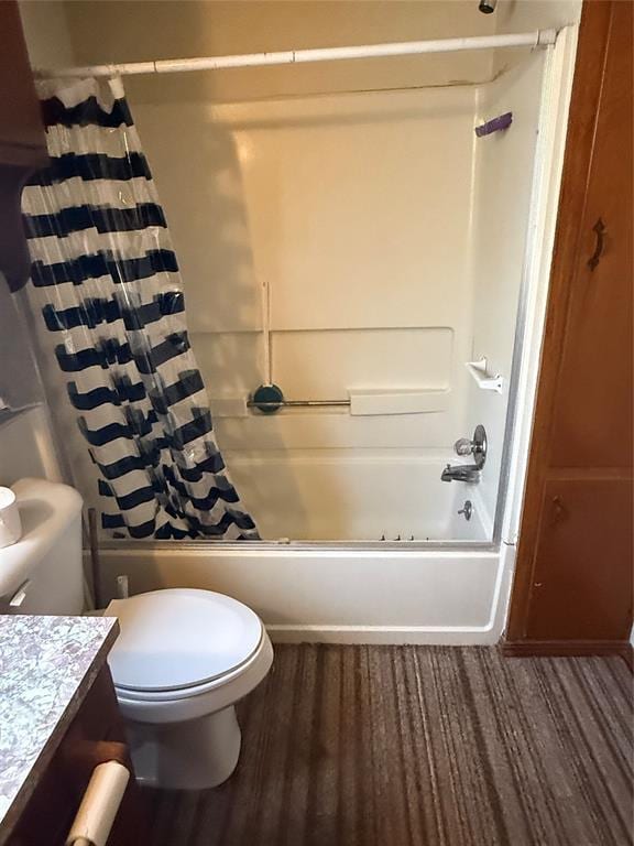 full bathroom featuring shower / bathtub combination with curtain, wood-type flooring, toilet, and vanity