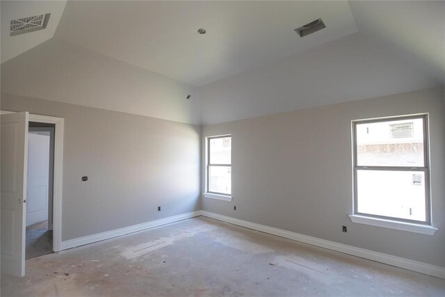 8116 NW 152nd Ter, Edmond, OK 73013 - empty room featuring vaulted ceiling and concrete floors
