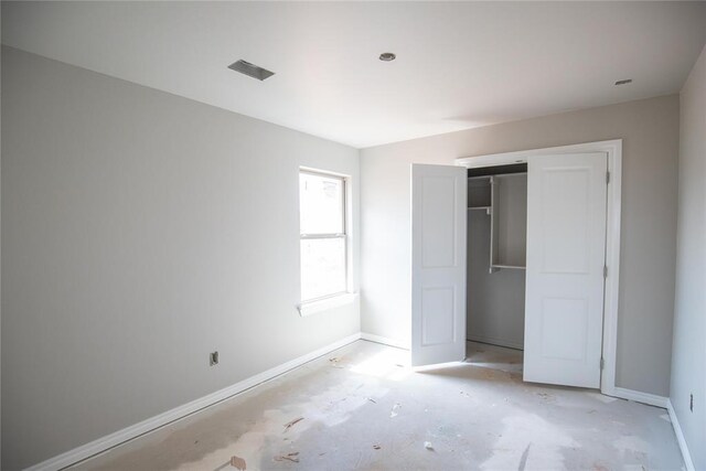 8116 NW 152nd Ter, Edmond, OK 73013 - unfurnished bedroom with baseboards and a closet