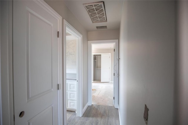 8116 NW 152nd Ter, Edmond, OK 73013 - hallway featuring light wood-type flooring
