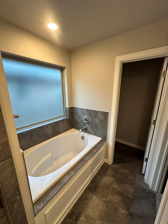 bathroom featuring a tub