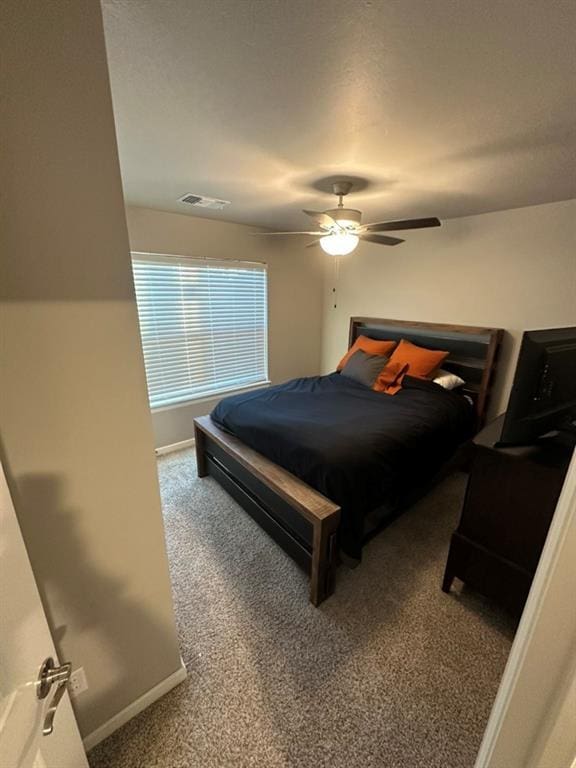 bedroom with carpet floors and ceiling fan