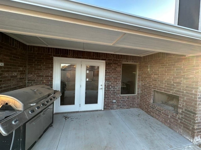 view of patio featuring a grill