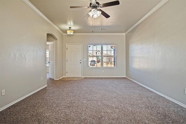 carpeted spare room with ornamental molding and ceiling fan