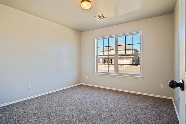 view of carpeted spare room