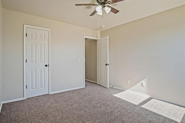 unfurnished bedroom featuring light carpet and ceiling fan