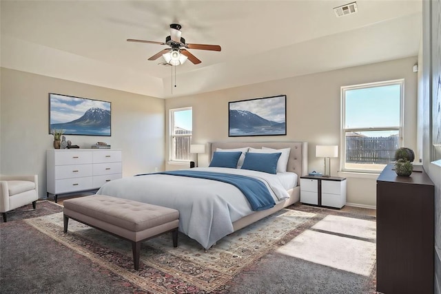 carpeted bedroom featuring ceiling fan