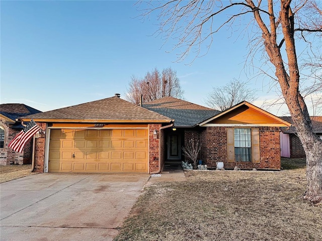 ranch-style home featuring a garage