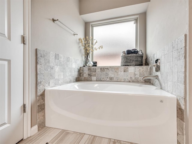 bathroom with a tub